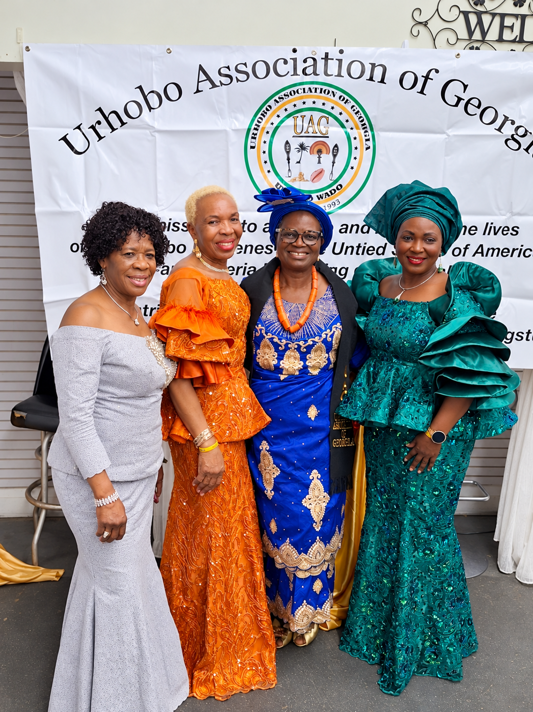 Four UWAONA women together in traditional attire